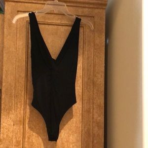 Donna Karan one piece sleeveless body suit.